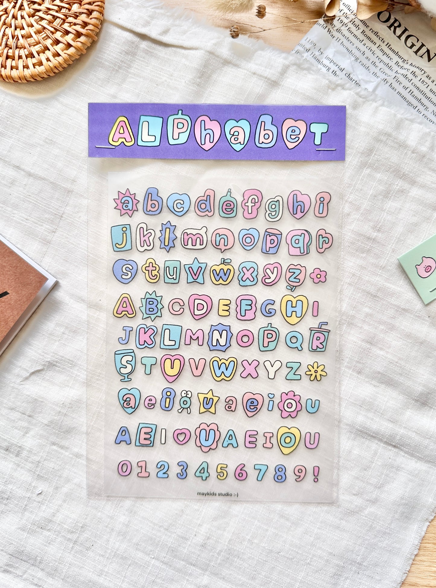 Sheet of colorful alphabet and number stickers with a purple border labeled 'Alphabet', cute, pastel, sticker, nz, new zealand, stationery, hope and letters 