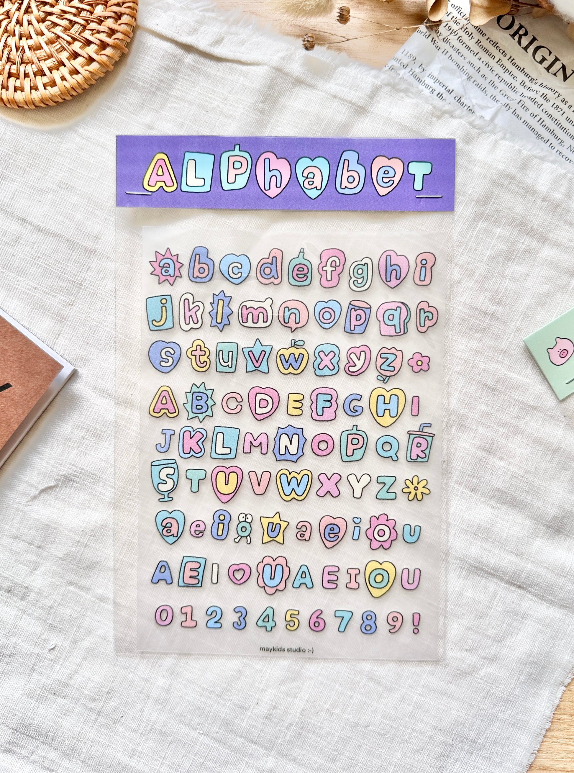 Sheet of colorful alphabet and number stickers with a purple border labeled 'Alphabet', cute, pastel, sticker, nz, new zealand, stationery, hope and letters 
