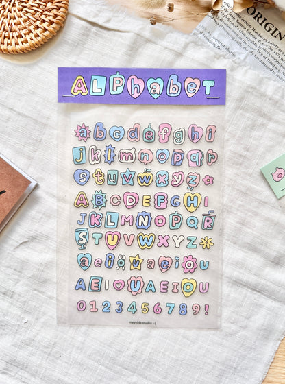 Sheet of colorful alphabet and number stickers with a purple border labeled 'Alphabet', cute, pastel, sticker, nz, new zealand, stationery, hope and letters 