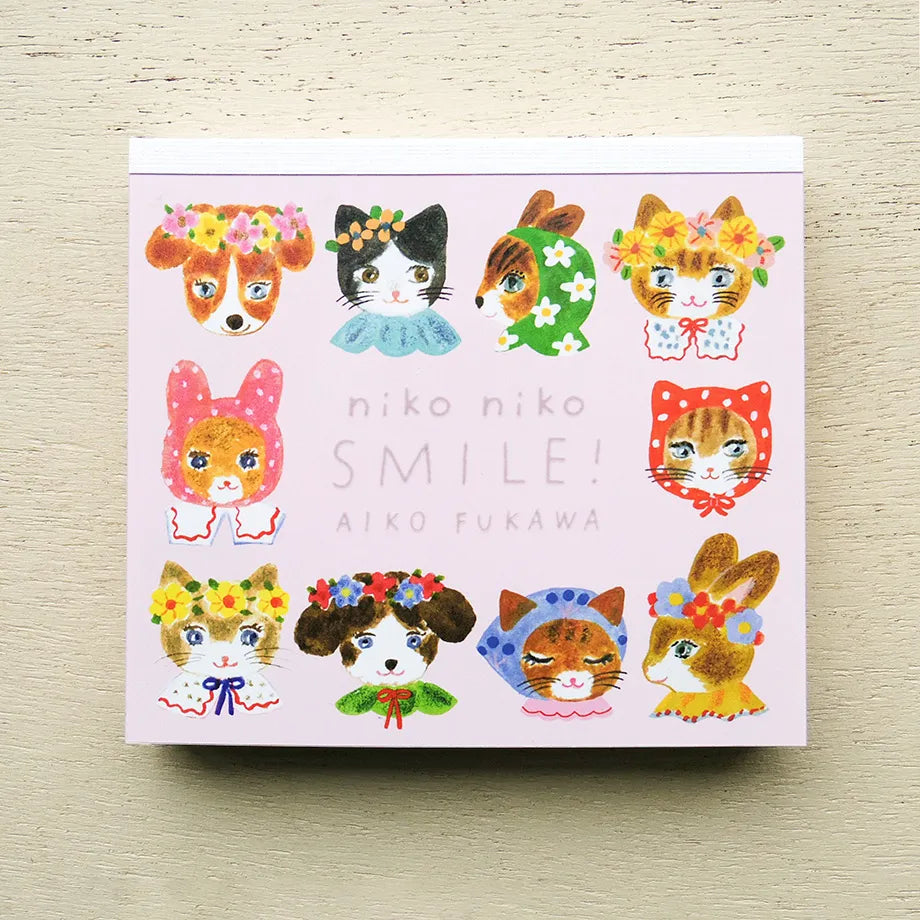 Card with illustrations of animals wearing colorful headbands on a light wooden surface, cat, rabbit, cute, japan, block memo, memopad, notepad, thick paper, smooth, aiko fukawa, nz, hope and letters, new zealand