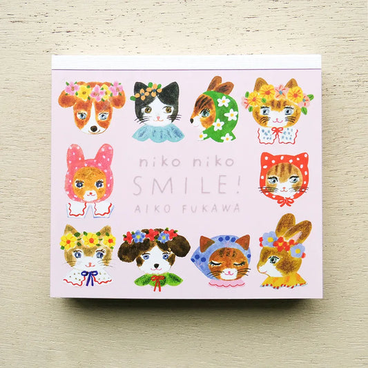 Card with illustrations of animals wearing colorful headbands on a light wooden surface, cat, rabbit, cute, japan, block memo, memopad, notepad, thick paper, smooth, aiko fukawa, nz, hope and letters, new zealand