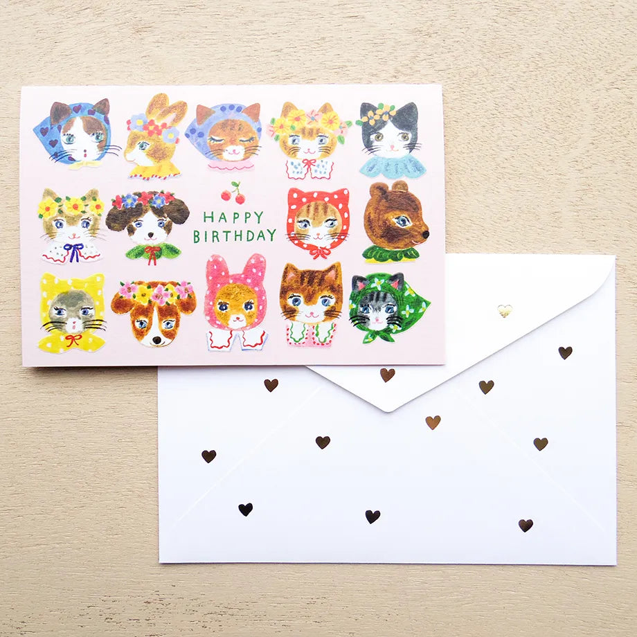 Birthday card with cat illustrations on a table with a pen and flowers. cute, birthday card, cat, flowers, floral, nz, hope and letters, nz, auckland, new zealand, stationery, gold foiled,