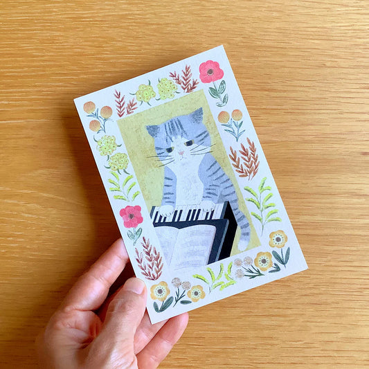 Grey Cat Plays Piano | Postcard