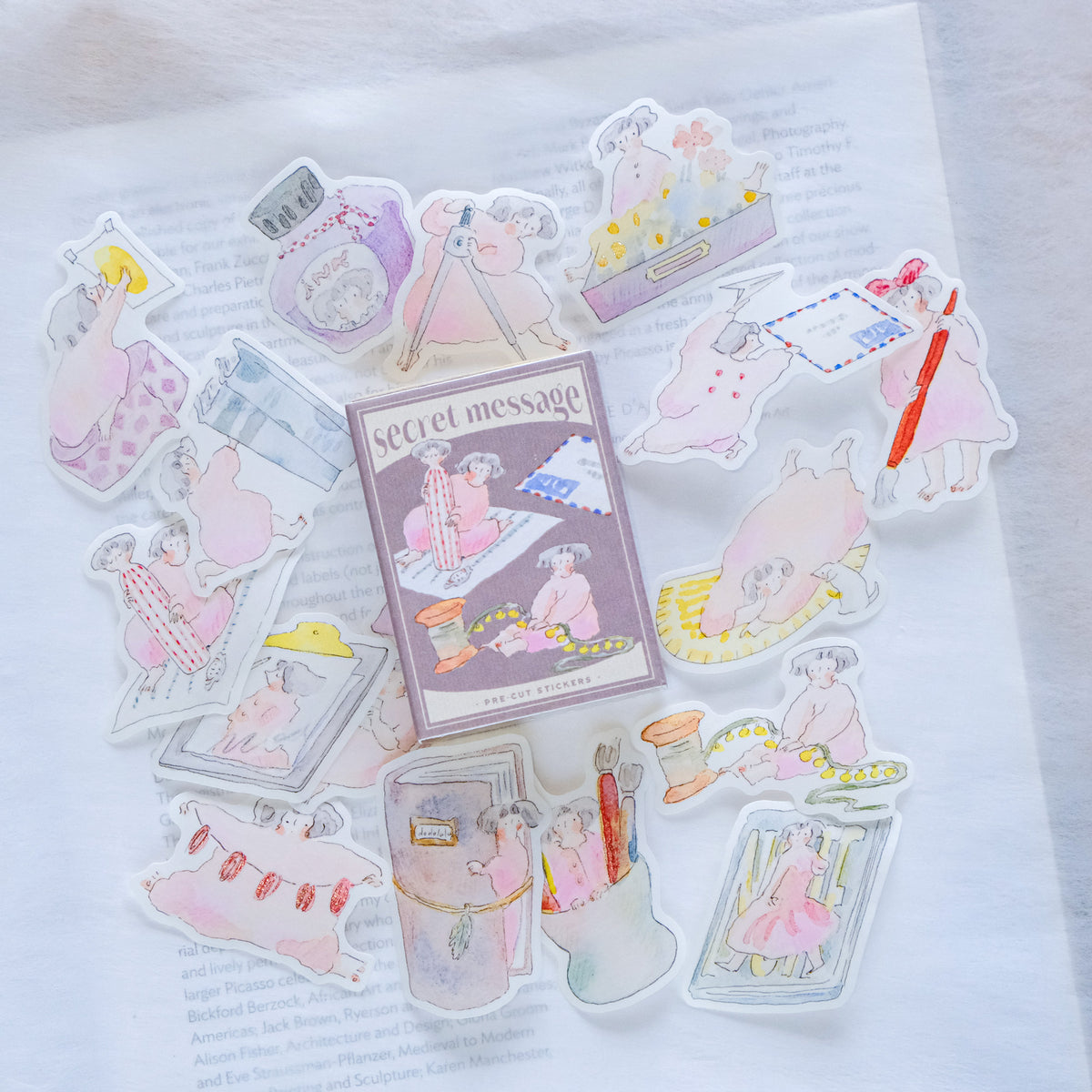 Collection of decorative stickers with a 'secret message' theme on a white surface, dodolulu, cute, hope and letters, nz, new zealand, pastel color, matchbox, sticker flakes