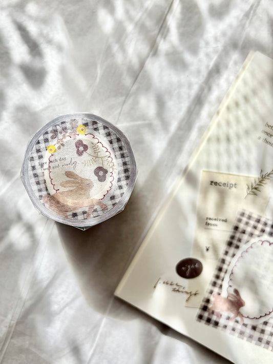 Decorative washi tape with cartoon design on a white fabric background, vellum paper, sticker, tracing paper, pion, hope and letters, nz, cute, floral, horse, rabbit