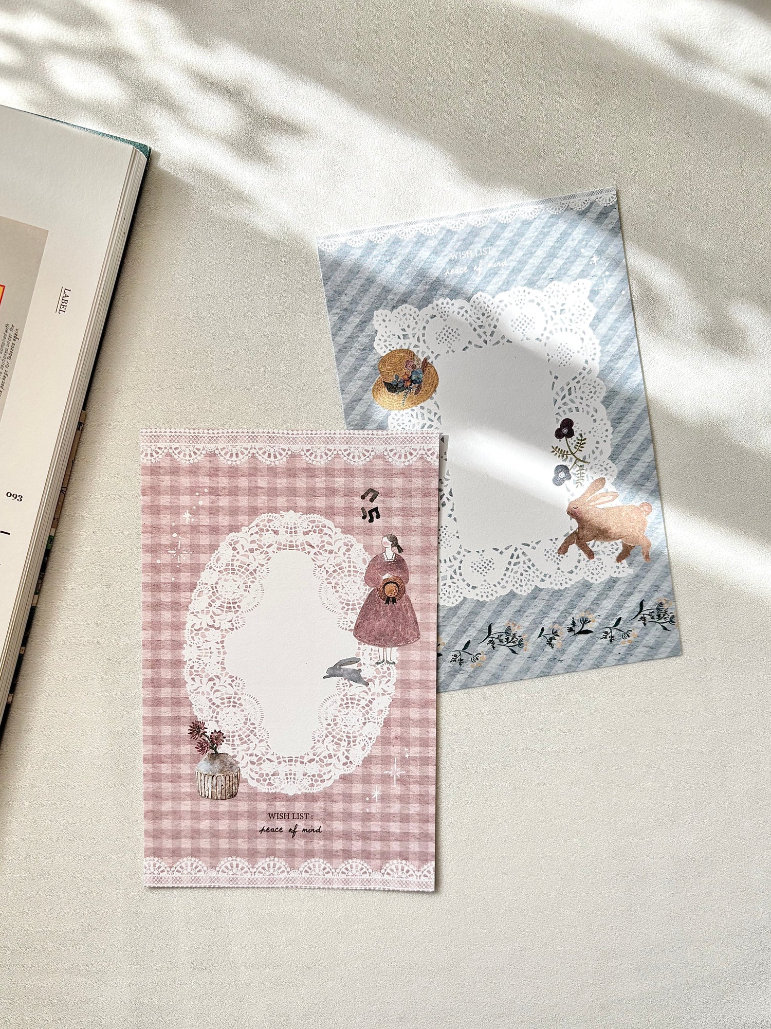 Two decorative memo sheets with cartoon characters on a light surface. memopad, notepad, taiwan, hope and letters, cute, note, message, paper, pink, blue, nz, stationery