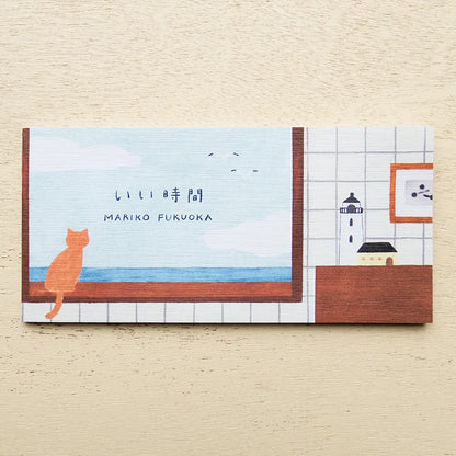 Notebook with a cat illustration and lighthouse on a tiled wall background, cute, cat, japan, nz, hope and letters, notebook, memopad, washi paper, cozy