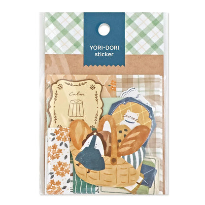 Packaged stickers with cartoon characters on a checkered background, featuring the brand 'YORI-DORI', stickers, hope and letters, nz, journal, cute, bread