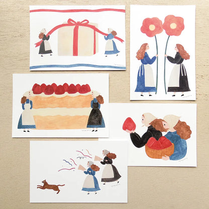 Set of four illustrated cards featuring people and a cake on a wooden surface, cute, japan, hope and letters, new zealand, nz, postcard, greeting card, birthday card, pretty card