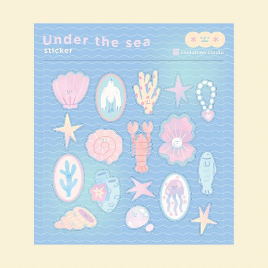 Sticker sheet with under the sea designs on a blue background, ocean, sea creature, jelly fish, star fish, sticker, nz, sea shells, pastel, cute