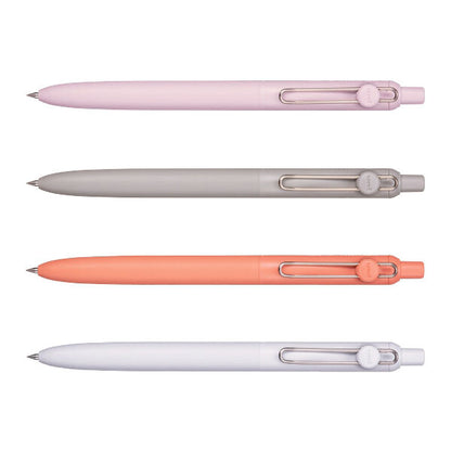 Four retractable ballpoint pens arranged horizontally on a white background, shown in pastel pink, light gray, coral orange, and white. Each pen has a metal clip, a circular end cap, and a silver tip. zento, pen, pastel, gel pen, nz, hope and letters, japan, 0.38